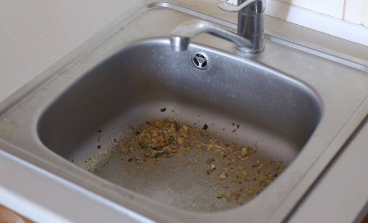 This Everyday Kitchen Essential Will Keep Your Black Sink Limescale-Free