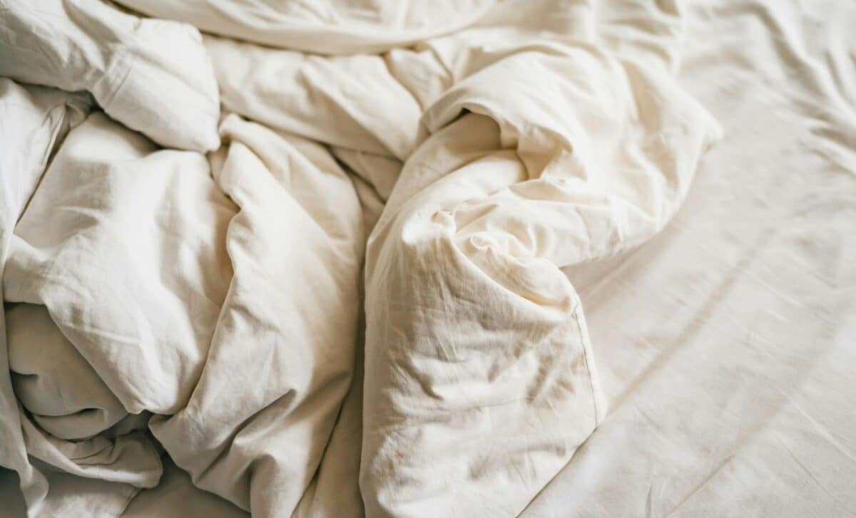 This Grandma Trick Using Old Sheets Replaces Plastic Garment Covers