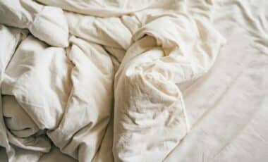 This Grandma Trick Using Old Sheets Replaces Plastic Garment Covers