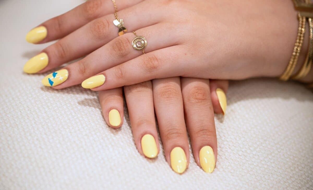 Butter Yellow Nails Are Back for Summer 2026, And They're the Perfect Match for a Sun-Kissed Glow