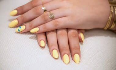 Butter Yellow Nails Are Back for Summer 2026, And They're the Perfect Match for a Sun-Kissed Glow